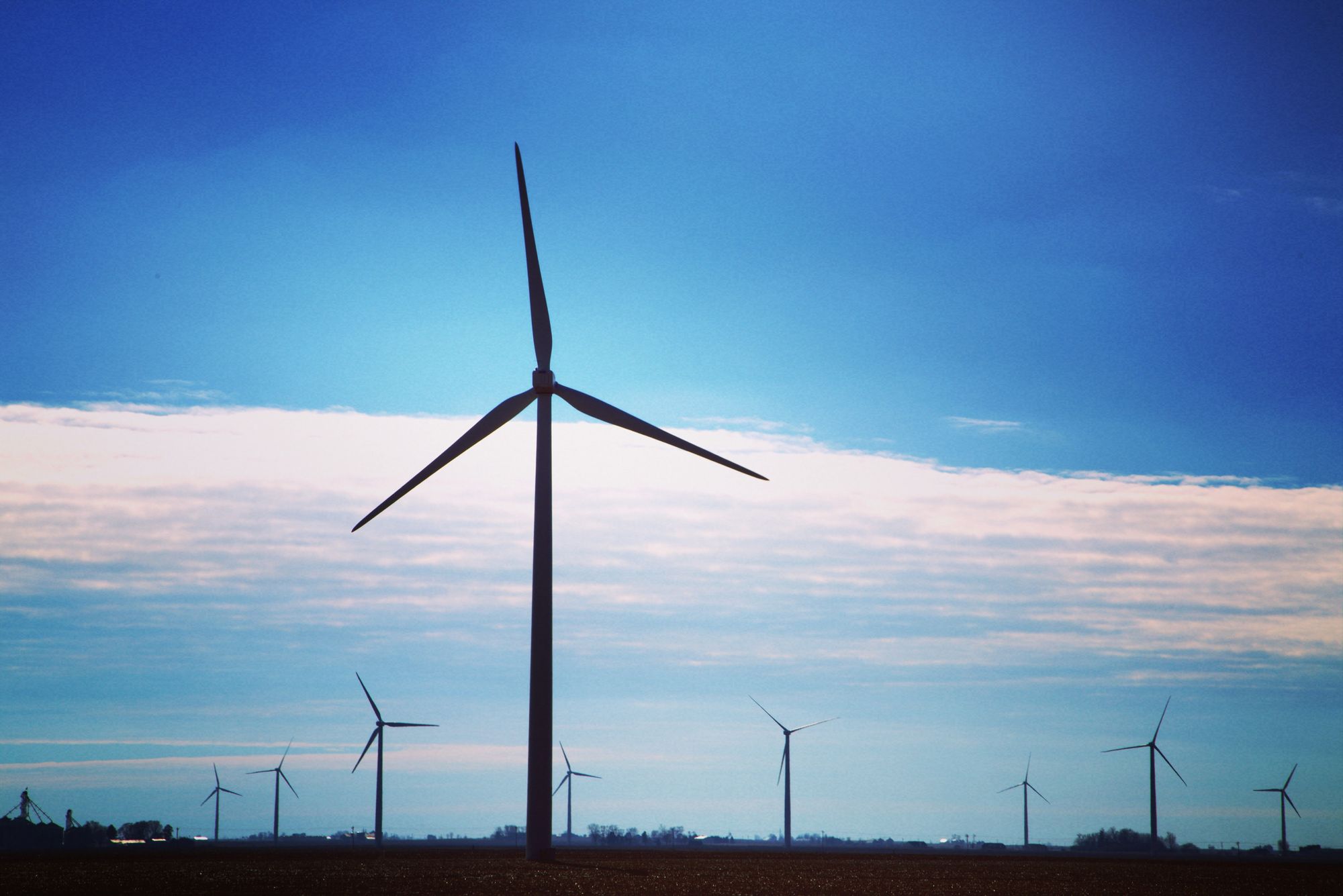 windfarm against a blue sky